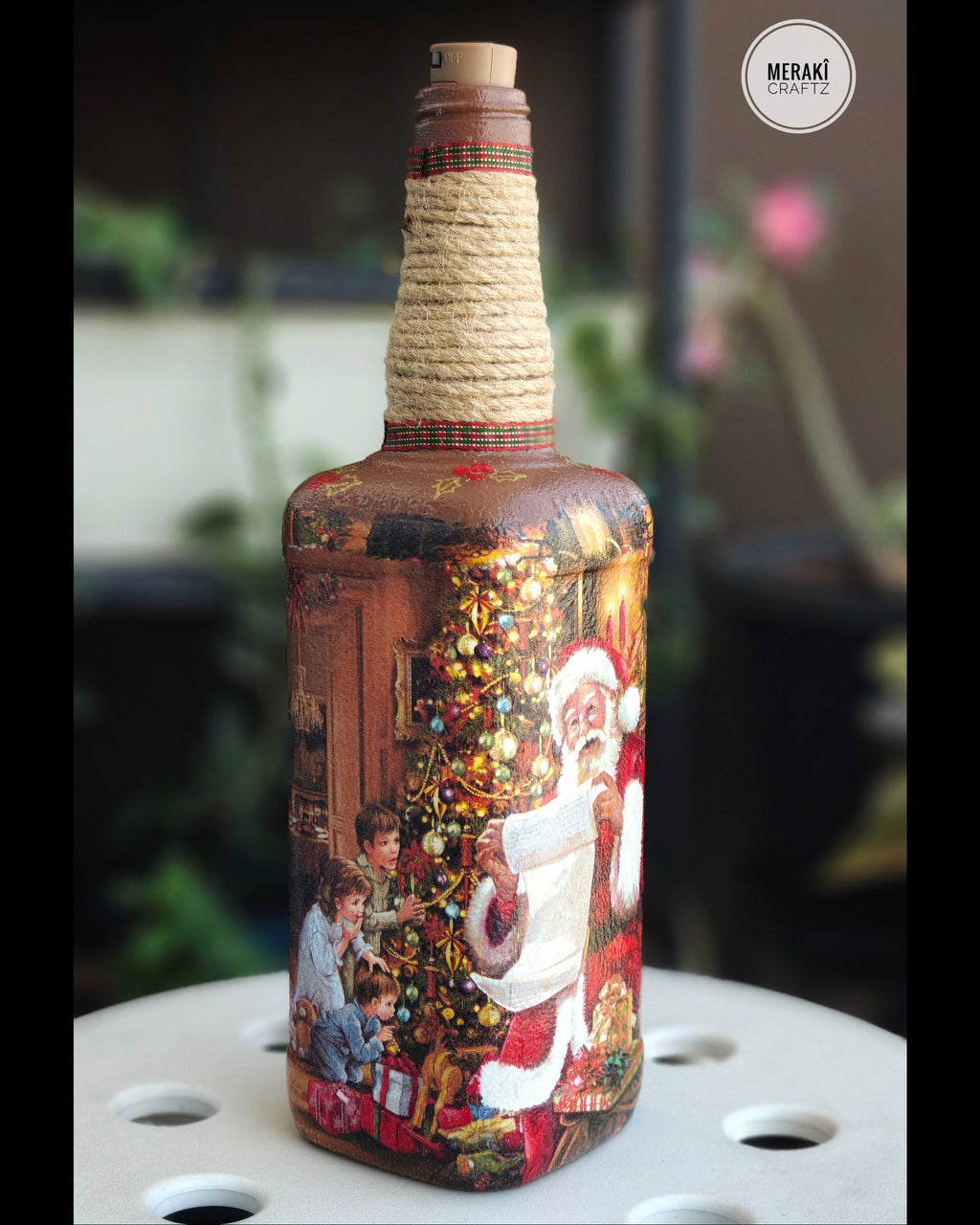 Handcrafted Upcycled Decoupaged Glass Bottle with Cork Light – Santa’s Christmas Celebration
