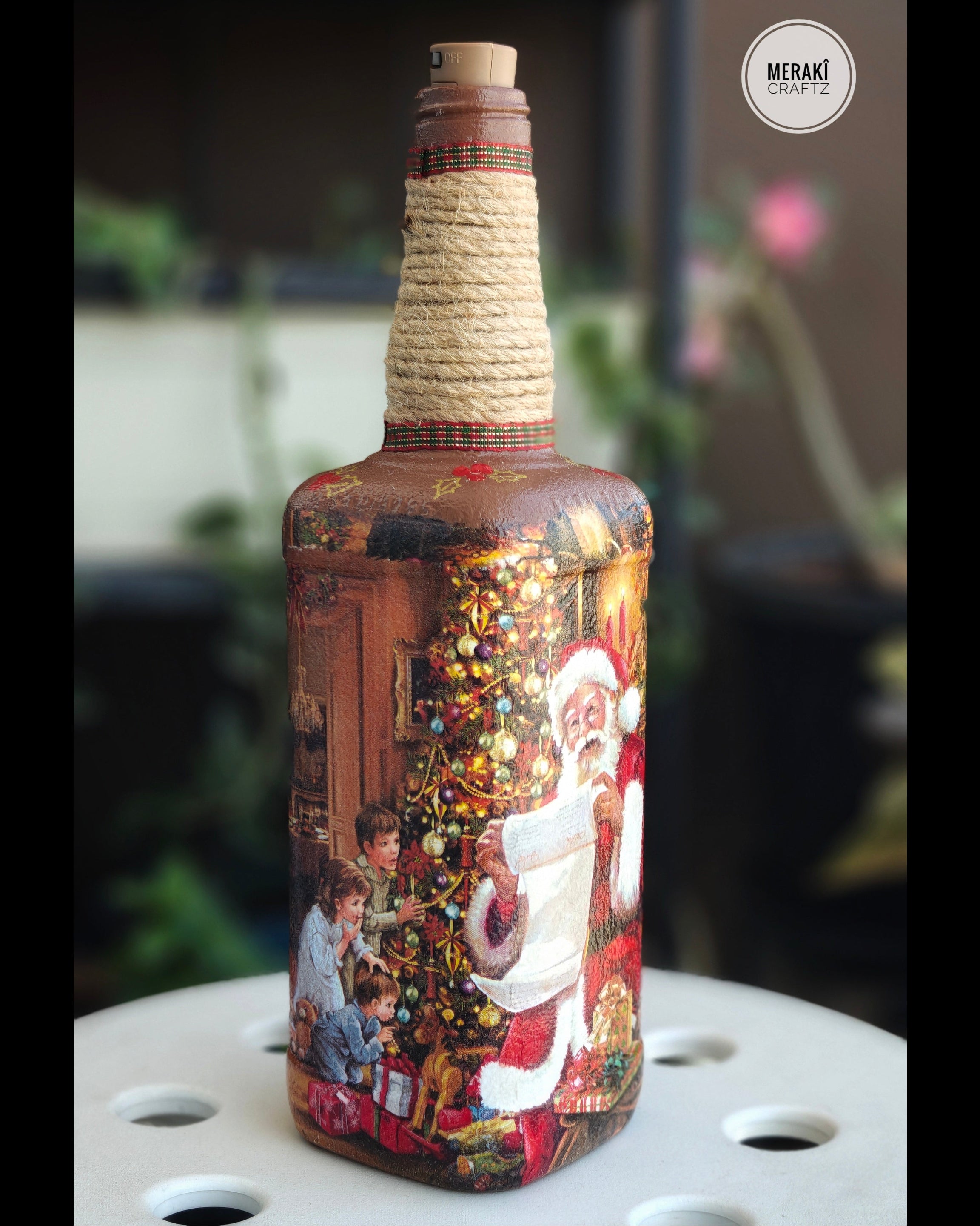 Handcrafted Upcycled Decoupaged Glass Bottle with Cork Light – Santa’s Christmas Celebration
